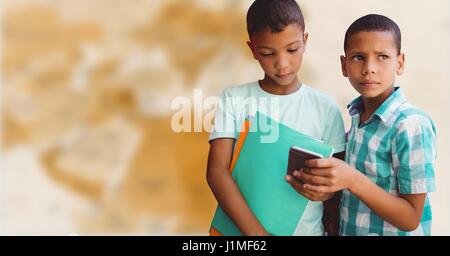 Digital composite of Boys with phone against blurry brown map Stock Photo