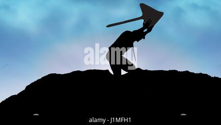 Digital composite of Silhouette businessman lifting arrow sign o mountain against sky Stock Photo