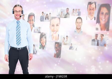 Digital composite of Digital composite image of HR executive wearing headphones by candidates Stock Photo