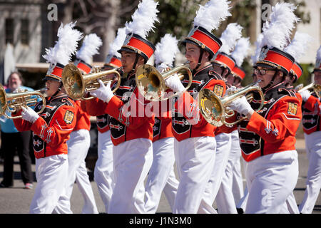 High school marching band cornet players during street parade - USA Stock Photo