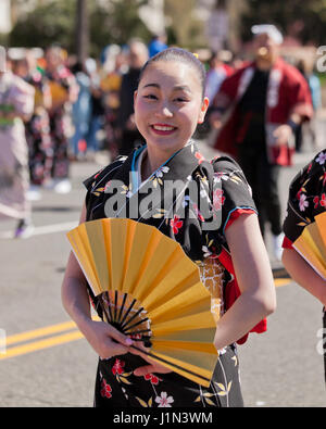 Young Japanese girls marching in the National Cherry Blossom Festival ...