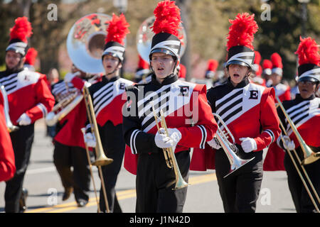 High school marching band trumpet player during parade - USA Stock Photo