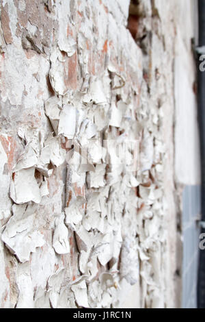 vintage background texture old masonry stone bricks on the ancient cement with cracks Stock Photo