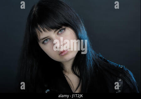 Portrait of lovely gothic girl on the roof. Pastel goth with