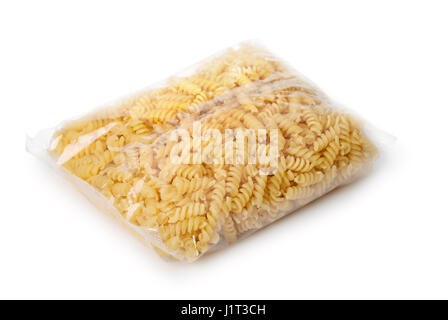 Transparent plastic bag of fusilli pasta isolated on white Stock Photo