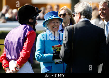 Queen Elizabeth II talks to jockey Ryan Moore before the Dubai Duty Free Tennis Championships Maiden Stakes during day two of the Dubai Duty Free Spring Trials & Beer Festival at Newbury Racecourse. Stock Photo