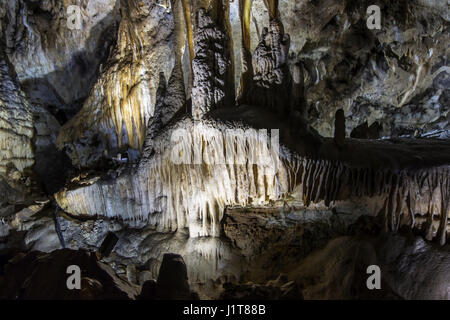 Flowstone / cave draperies, sheetlike deposits of calcite suspended from ceiling in the Caves of Han-sur-Lesse / Grottes de Han, Ardennes, Belgium Stock Photo