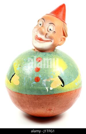 antique roly-poly doll isolated on white background Stock Photo - Alamy