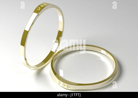 3D illustration of two golden rings with diamonds on a grey background Stock Photo