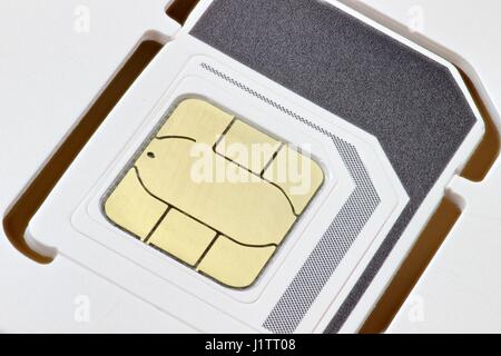 triple SIM card for mobile communication Stock Photo