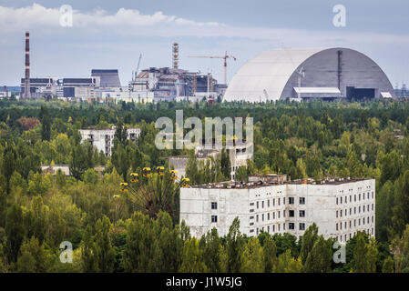 Aerial view of Pripyat ghost city, Ukraine. View with New Safe Confinement of Chernobyl Nuclear Power Plant Stock Photo