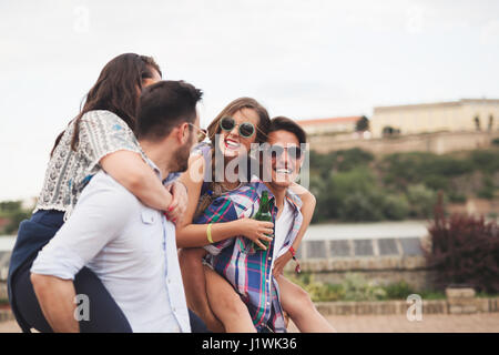 Happy group of friends enjoying festival and having fun Stock Photo