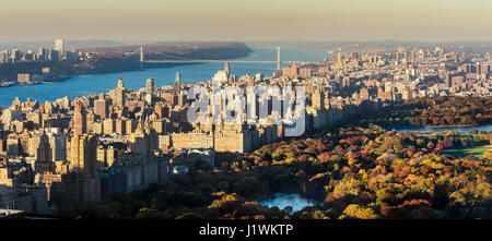 Panoramic elevated view of Central Park, Upper West Side and the George Washington Bridge with Hudson River in Fall. Manhattan, New York CIty Stock Photo