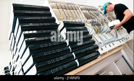 Cable modem testing and servicing on a test bench Stock Photo