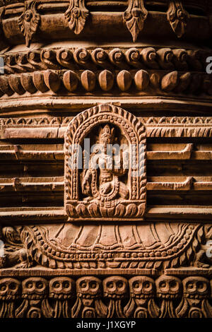 Detail of an ornately carved wooden column of one of the temples in Durbar Square, Kathmandu. Stock Photo