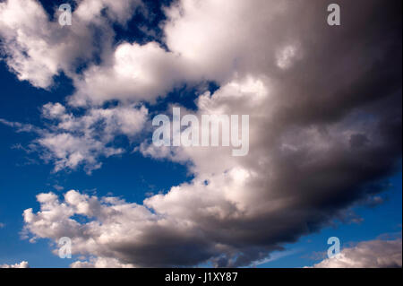 Cumulus clouds in blue sky fairweather clouds on a bright sunny day Stock Photo