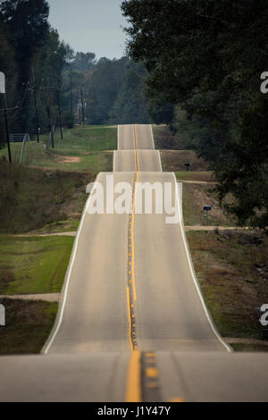 Undulating country road somewhere in Mississippi. Stock Photo