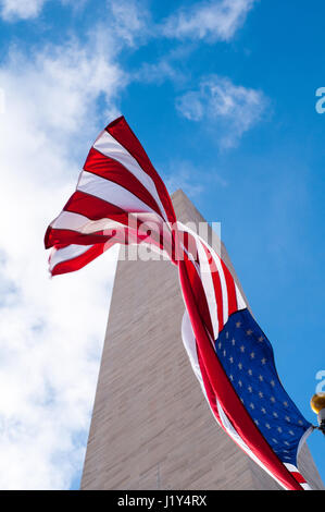 American flag flying in front of the Washington Monument, Washington DC, USA Stock Photo