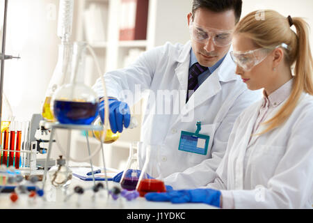 Team of scientists in laboratory - medical research Stock Photo
