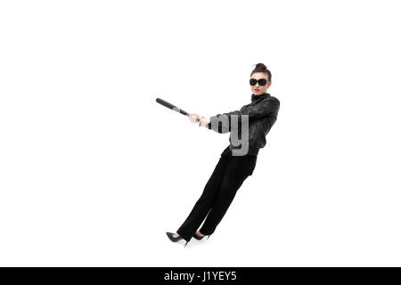 Portrait of an angry woman with a bat, isolated on white background. Serious and strict debt collector Stock Photo