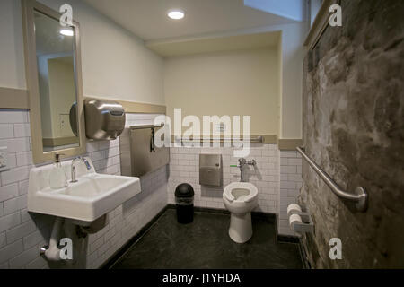 The public restroom at the visitor's area in the Paul Revere House in Boston, Massachusetts. Stock Photo