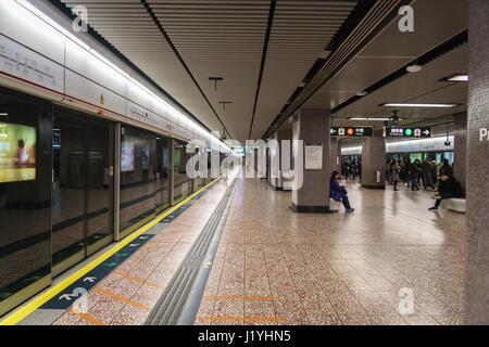 Hong Kong - circa March 2017: MTR station in Hong Kong. The Mass Transit Railway is the rapid transit railway system of Hong Kong. Stock Photo