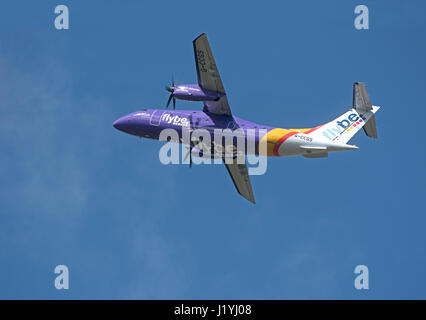 Flyby Saab 2000 Civil Airliner departing Inverness Dalcross Airport for Manchester. Stock Photo