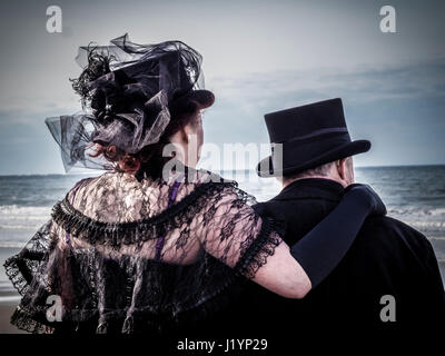 Whitby, UK. 22nd April, 2017. The Whitby Goth Weekend (WGW), an alternative music festival founded in 1994 by Jo Hampshire of Top Mum Promotions has grown to become one of the world’s premier Goth events. Alongside the music, Goths and Steam Punk fans take the opportunity to dres up in costume and promenade through the narrow streets of the seaside town. Photo Bailey-Cooper Photography/Alamy Live News Stock Photo