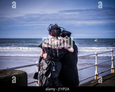 Whitby, UK. 22nd April, 2017. The Whitby Goth Weekend (WGW), an alternative music festival founded in 1994 by Jo Hampshire of Top Mum Promotions has grown to become one of the world’s premier Goth events. Alongside the music, Goths and Steam Punk fans take the opportunity to dres up in costume and promenade through the narrow streets of the seaside town. Photo Bailey-Cooper Photography/Alamy Live News Stock Photo