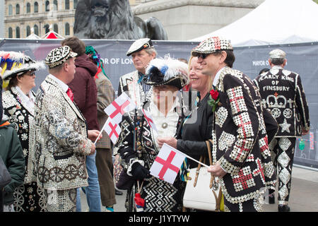 London, UK. 22nd April, 2017. St George's Day 2017 celebrations in Trafalgar Square in London, England United Kingdom. The annual free event was organised by the Mayor of London and attracted a huge crowd celebrating the Patron Saint of England. Some people in the crowd were very colourful and some wore costumes for the joy of children and adults. The pearly Kings and Queens of various parts of London were also present at the celebrations. Credit: Chris Pig Photography/Alamy Live News Stock Photo