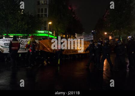 Berlin, Berlin, Germany. 22nd Apr, 2017. Several hundred demonstrators gathered for the 'interkiezionale' demonstration through the Berlin districts Friedrichshain, Kreuzberg and NeukÃ¶lln to protest against displacement, gentrification, the loss and housing, business space as well as against eviction. A broad alliance of local residents' initiatives, project groups, house communities and political groups had previously called for the demonstration. The demonstrators held banners with the inscription, ''Against the City of the Rich!''. Fireworks were thrown out of the demonstration occasiona Stock Photo