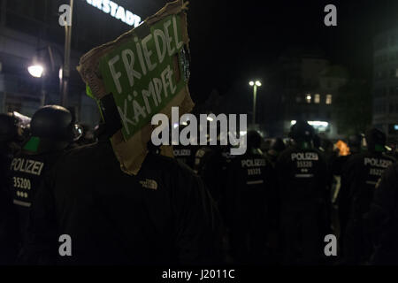 Berlin, Berlin, Germany. 22nd Apr, 2017. Several hundred demonstrators gathered for the 'interkiezionale' demonstration through the Berlin districts Friedrichshain, Kreuzberg and NeukÃ¶lln to protest against displacement, gentrification, the loss and housing, business space as well as against eviction. A broad alliance of local residents' initiatives, project groups, house communities and political groups had previously called for the demonstration. The demonstrators held banners with the inscription, ''Against the City of the Rich!''. Fireworks were thrown out of the demonstration occasiona Stock Photo