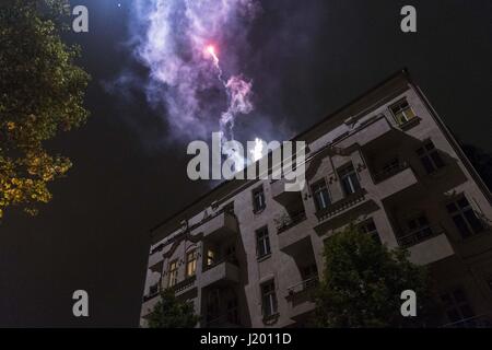 Berlin, Berlin, Germany. 22nd Apr, 2017. Several hundred demonstrators gathered for the 'interkiezionale' demonstration through the Berlin districts Friedrichshain, Kreuzberg and NeukÃ¶lln to protest against displacement, gentrification, the loss and housing, business space as well as against eviction. A broad alliance of local residents' initiatives, project groups, house communities and political groups had previously called for the demonstration. The demonstrators held banners with the inscription, ''Against the City of the Rich!''. Fireworks were thrown out of the demonstration occasiona Stock Photo