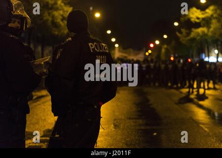 Berlin, Berlin, Germany. 22nd Apr, 2017. Several hundred demonstrators gathered for the 'interkiezionale' demonstration through the Berlin districts Friedrichshain, Kreuzberg and NeukÃ¶lln to protest against displacement, gentrification, the loss and housing, business space as well as against eviction. A broad alliance of local residents' initiatives, project groups, house communities and political groups had previously called for the demonstration. The demonstrators held banners with the inscription, ''Against the City of the Rich!''. Fireworks were thrown out of the demonstration occasiona Stock Photo