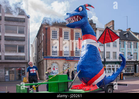 Market Square, Northampton. U.K. 23rd April 2017. Saint George's Day. A Sculpture by Mick Henson of Saint George and the Dragon being set up on the market Square early this morning, representing Good over Evil for St Georges Day,  Mick has his studio in Bozeat, Northamptonshire. Credit: Keith J Smith./Alamy Live News Stock Photo