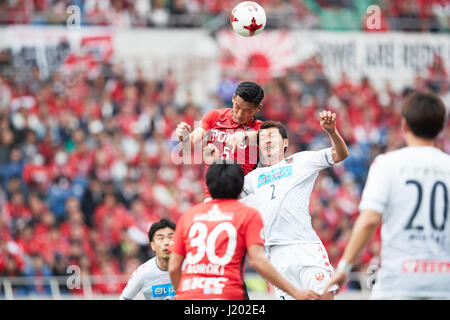 Saitama, Japan. 22nd Apr, 2017. (L to R) Tomoaki Makino (Reds), Tomonobu Yokoyama (Consadole), April 22, 2017 - Football/Soccer : 2017 J1 League match between Urawa Red Diamonds 3-2 Consadole Sapporo at Saitama Stadium 2002 in Saitama, Japan. Credit: AFLO SPORT/Alamy Live News Stock Photo