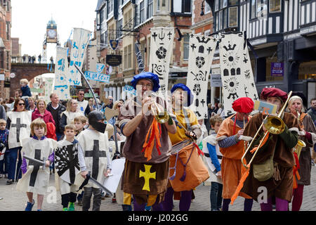 Chester, UK. 23rd April 2017. The St George's day parade through the streets of Chester with a medieval street theatre performance and band. Credit: Andrew Paterson/Alamy Live News Stock Photo