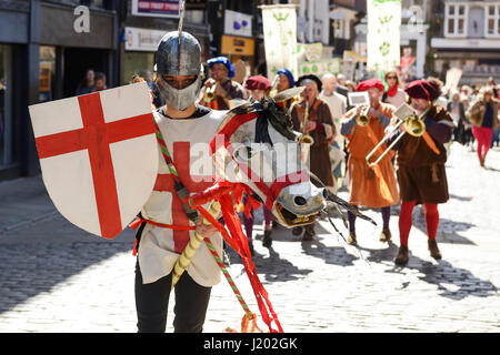 Chester, UK. 23rd April 2017. St George rides his horse through the streets of Chester as part of the St George's day parade with a medieval street theatre performance. Credit: Andrew Paterson/Alamy Live News Stock Photo
