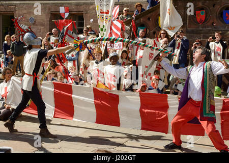 Chester, UK. 23rd April 2017. St George takes part in a jousting contest in Chester as part of the St George's day medieval street theatre performance. Credit: Andrew Paterson/Alamy Live News Stock Photo