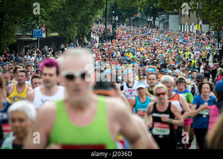 London, UK. 23rd Apr, 2017. Thousands of runners during the 37th London Marathon pass through Deptford in south east London. Credit: Guy Corbishley/Alamy Live News Stock Photo