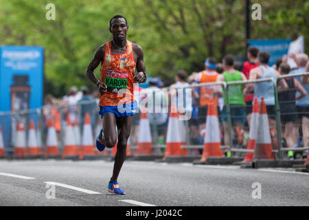 London, UK. 23rd Apr, 2017. Bedan Karoki of Kenya, who finished 3rd in the men's event, runs through Shadwell close to the 22-mile point of the 2017 Virgin Money London Marathon. Credit: Mark Kerrison/Alamy Live News Stock Photo