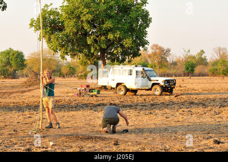 Setting up equipment for bat survey in Africa Stock Photo