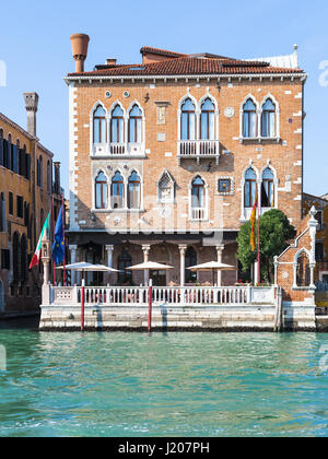 VENICE, ITALY - MARCH 30, 2017: facade of Palazzetto Stern on Grand Canal in Venice. The Grand Canal forms one of the major water-traffic corridors in Stock Photo