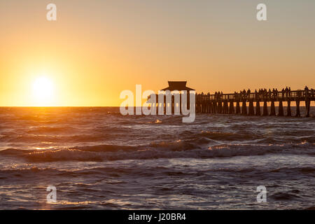 Silhouette of the fishing pier in Naples at sunset. Florida, United States Stock Photo