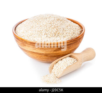 bran in bowl with wooden scoop isolated on white background. Food supplement to improve digestion. Dietary fiber. Product for healthy nutrition and di Stock Photo