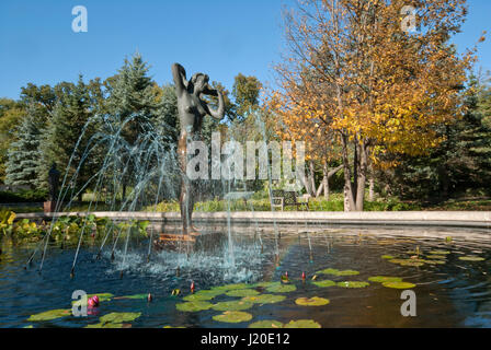 Bronze sculpture and fountain in the pool, Leo Mol Sculpture Garden in the Assiniboine Park, Winnipeg, Manitoba, Canada Stock Photo