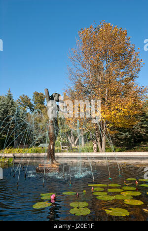 Bronze sculpture and fountain in the pool, Leo Mol Sculpture Garden in the Assiniboine Park, Winnipeg, Manitoba, Canada Stock Photo