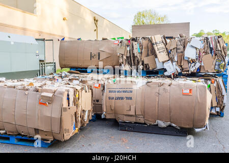 Burke, USA - April 16, 2017: Compacted cardboard boxes behind Walmart store building Stock Photo