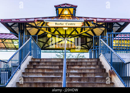 Burke, USA - April 16, 2017: Burke Centre train station platform with stairs and sign Stock Photo