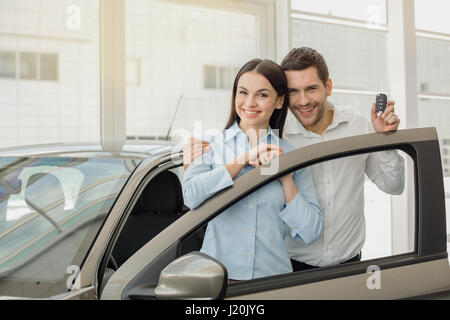Young People in a Car Rental Service Transportation Concept Stock Photo